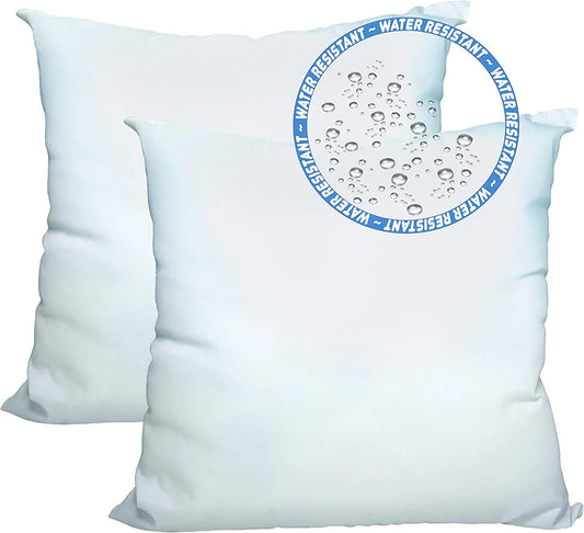 Outdoor pillow inserts: set of two white pillows resistant to outdoor conditions.